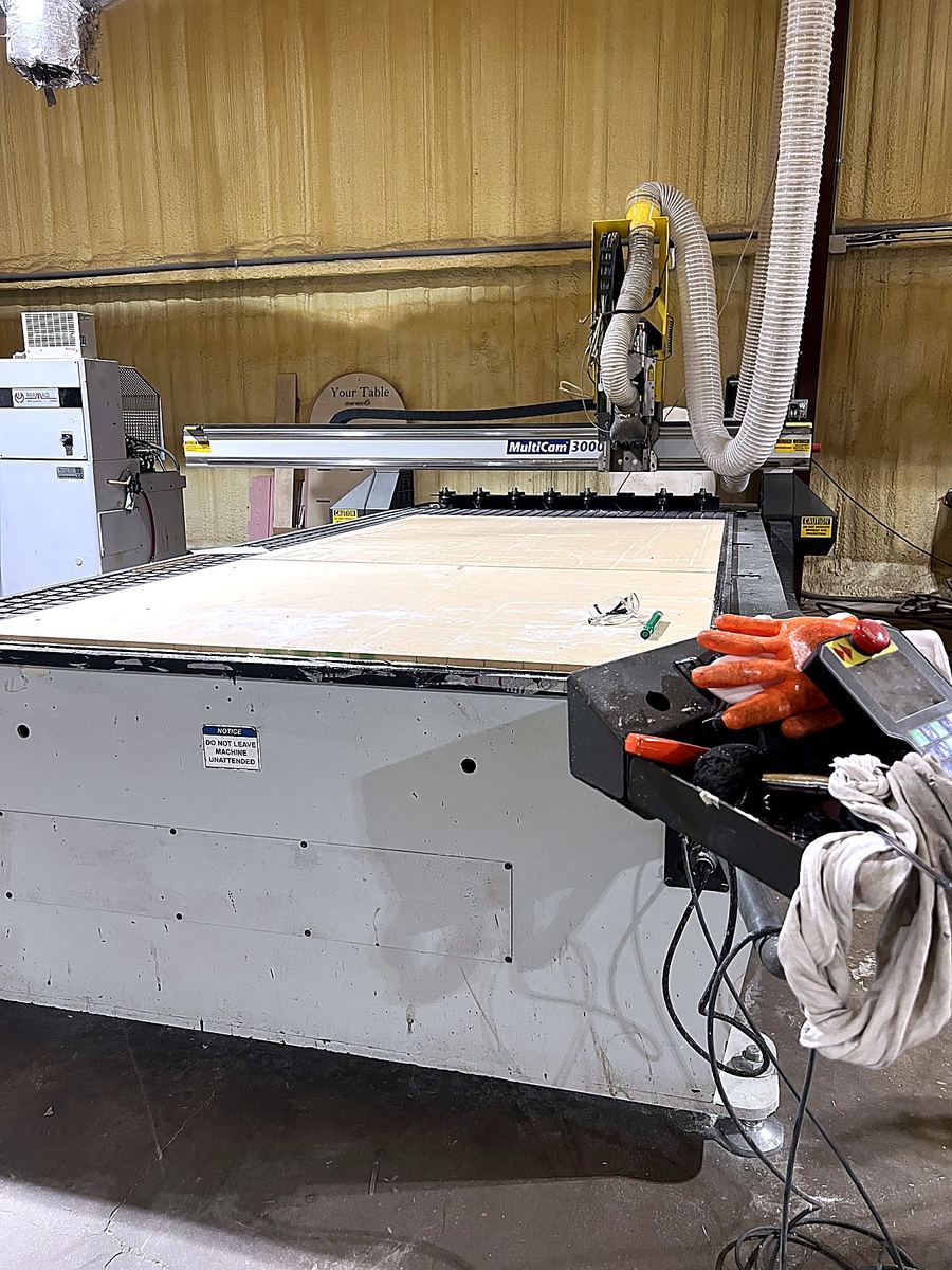 CNC-routed slat cladding, sized off the site drawings
